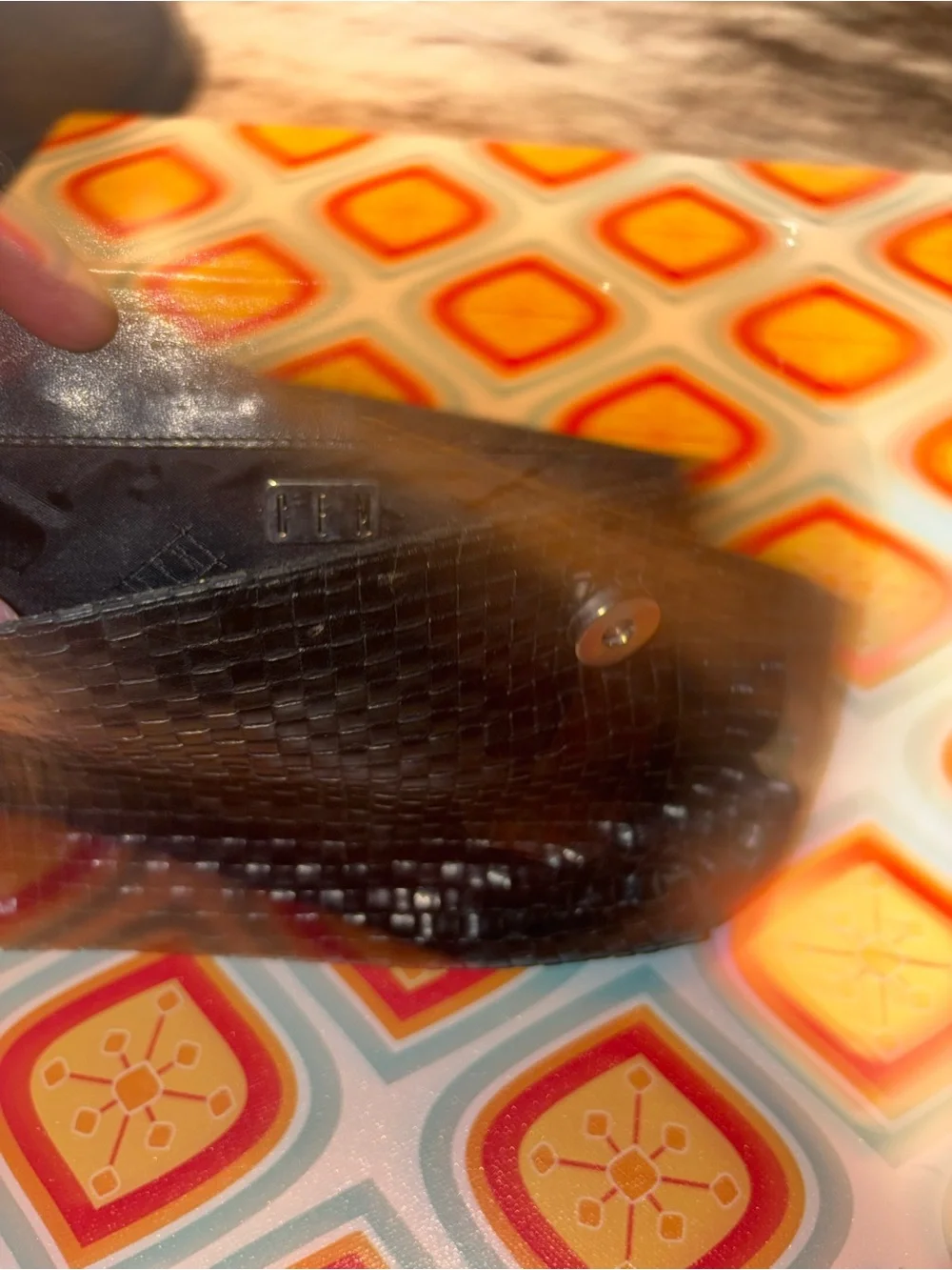 Gem Woven Black Leather Clutch Bag